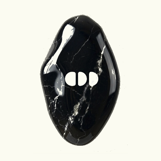 Polished veined stone with mark